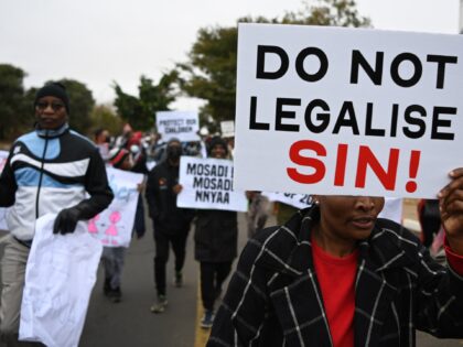Demonstrators from the Coalition of Botswana Christian Churches chants slogans against hom