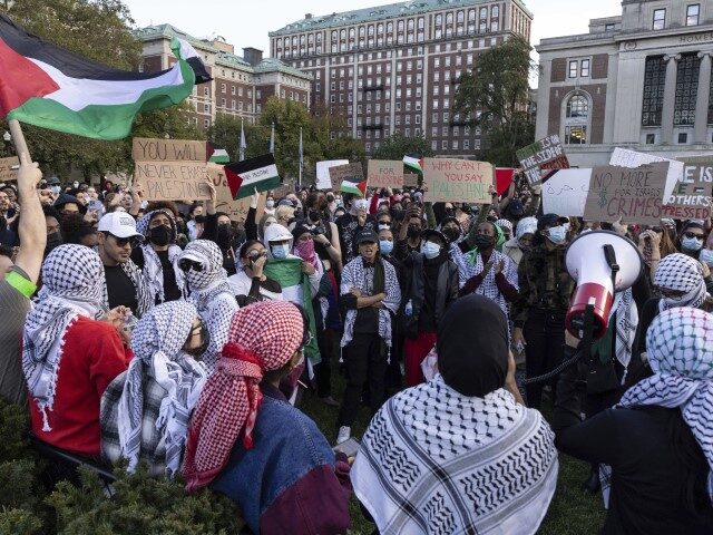 Pro-Palestinian demonstrators gather for a protest at Columbia University, Thursday, Oct.