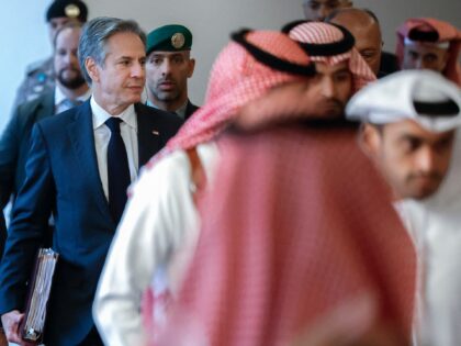 US Secretary of State Antony Blinken walks during the US-Arab Quint Meeting with represent