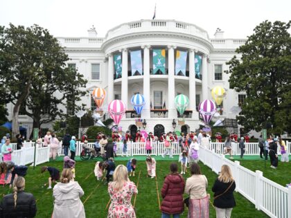 Children participate in the annual Easter Egg Roll on the South Lawn of the White House in
