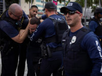 WATCH: Florida Police Drag Pro-Palestinian Protesters Blocking Road off the Street