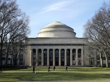 FILE - Students walk past the "Great Dome" atop Building 10 on the Massachusetts Institute
