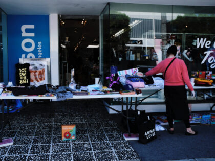 Shoppers outside Kitson, which opened for curbside pickup on May 8, 2020 in Los Angeles, C