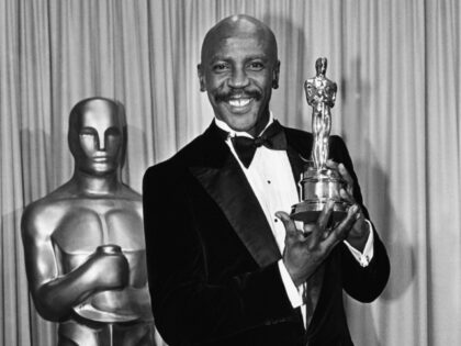 Louis Gossett, Jr. wins the Academy Award for "Best Supporting Actor" during a 1983 Los An