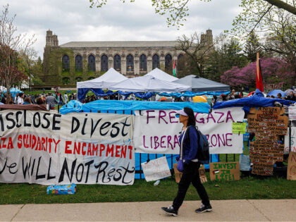 A person walks past a pro-Palestinian encampment at Northwestern University, April 28, 202