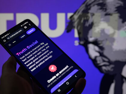 The Truth Social app is being displayed on a smartphone. (Jonathan Raa/NurPhoto via Getty