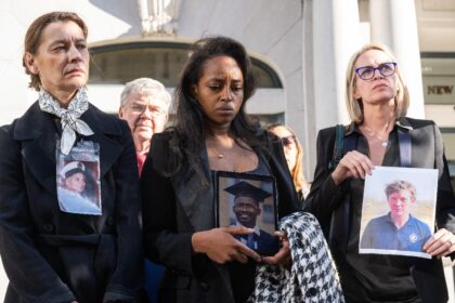 Catherine Berthet (L) and Naoise Ryan (R) join relatives of people killed in the Ethiopian