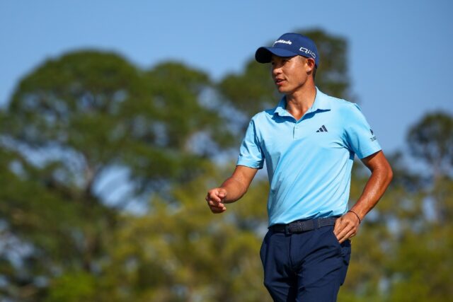 Collin Morikawa reacts after making a birdie on the 17th hole during the first round of th