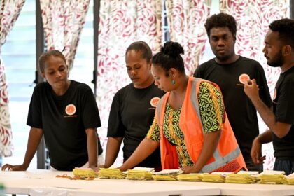 Electoral officers count votes from the general election in Solomon Islands, where pro-Chi