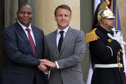 France's President Emmanuel Macron (centre) and his Centrafrican counterpart Faustin-Archa