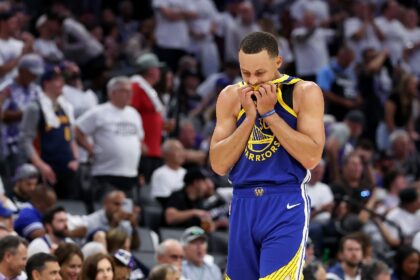 Golden State star Stephen Curry wipes his face in the waning minutes of the Warriors' seas