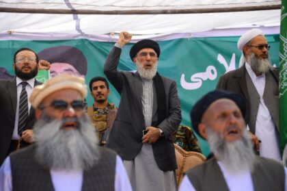 Gulbuddin Hekmatyar (C) addressing supporters during a campaign rally in Herat in 2019