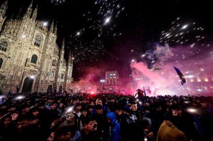 Inter Milan fans, who gathered in front of the cathedral to celebrate their Sere A title,