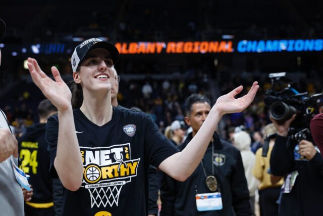 Iowa's Caitlin Clark celebrates after beating LSU 94-87 in what was the highest-rated US w