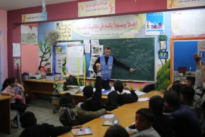 Ismail Wahba, director of the UNRWA Taif School in Rafah, teaches an English class in the