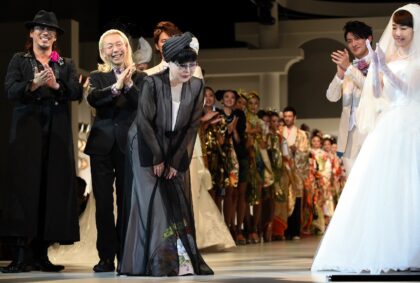 Japanese fashion designer Yumi Katsura (C) helped popularise Western bridal wear in Japan