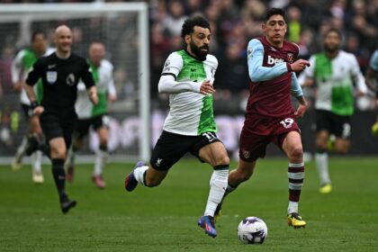 Liverpool substitute Mohamed Salah (C) attacks during a 2-2 draw at West Ham United.