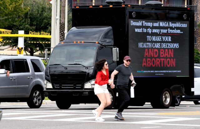 A mobile billboard sponsored by the Democratic National Committee in Kissimmee, Florida, i