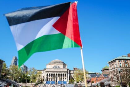 A Palestinian flag is seen around the protest encampment on the campus of Columbia Univers