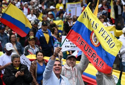 People take part in a march against the government of Colombian President Gustavo Petro ov