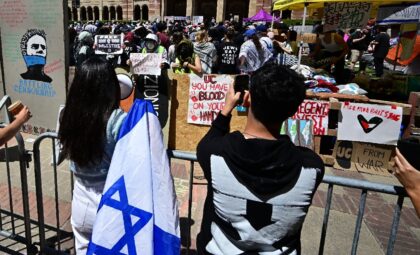 Pro-Israel (front) and pro-Palestinian students face off at an encampment on the campus of
