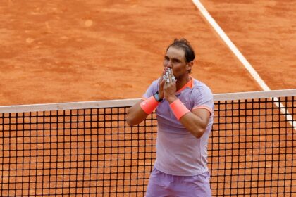 Rafael Nadal salutes the Madrid crowd after beating Pedro Cachin