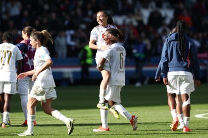 Selma Bacha and Melchie Dumornay, Lyon's two goal-scorers, celebrate together after their