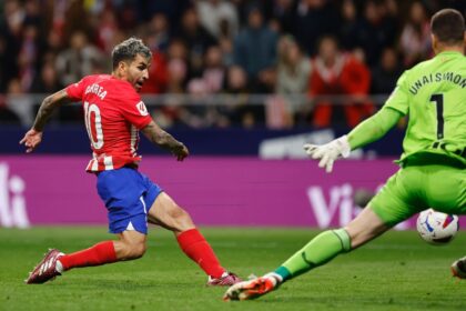 On target: Atletico Madrid's Angel Correa scores his team's second goal