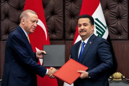 Turkey's President Recep Tayyip Erdogan and Iraq's Prime Minister Mohammed Shia al-Sudani