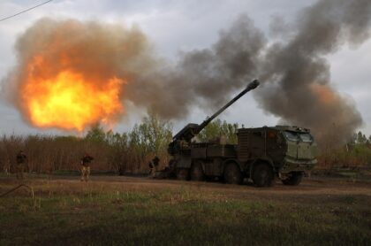 Ukrainian forces fire at Russian troops with a 155 mm self-propelled howitzer 2C22 "Bohdan