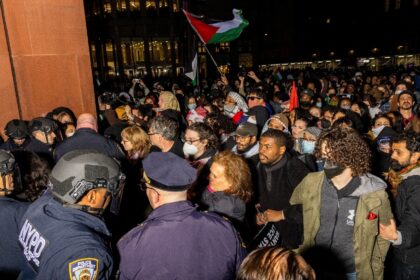New York Police Department officers detain pro-Palestinian students and protesters who had