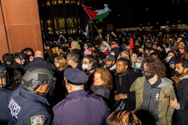 New York Police Department officers detain pro-Palestinian students and protesters who had