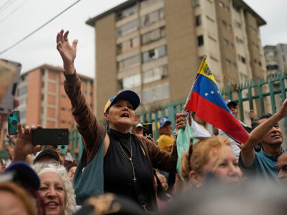 Supporters of opposition leader Maria Corina Machado, who has been banned from running for