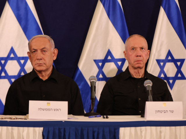 TOPSHOT - Israeli Prime Minister Benjamin Netanyahu (L) and Defence Minister Yoav Gallant attend a press conference in the Kirya military base in Tel Aviv on October 28, 2023 amid ongoing battles between Israel and the Palestinian group Hamas. Netanyahu said on October 28 that fighting inside the Gaza Strip would be "long and difficult", as Israeli ground forces operate in the Palestinian territory for more than 24 hours. (Photo by Abir SULTAN / POOL / AFP) (Photo by ABIR SULTAN/POOL/AFP via Getty Images)