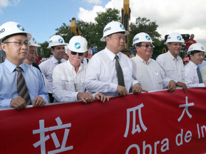 Chinese businessman Wang Jing (C) of HKND Group, members of the Nicaraguan government and