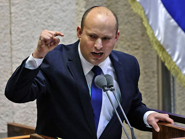 Head of Israel's right-wing Yamina party Naftali Bennett addresses lawmakers during a