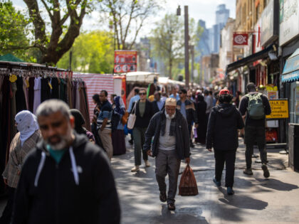 LONDON, ENGLAND - MAY 24: People walk along Whitechapel High Street on May 24, 2023 in Lon