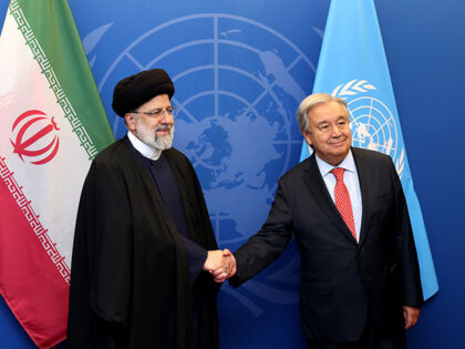 Iranian President Ebrahim Raisi (L) and United Nations (UN) Secretary-General Antonio Gute