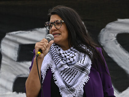 Palestinian descent US Congresswoman Rashida Tlaib takes part in a demonstration organized
