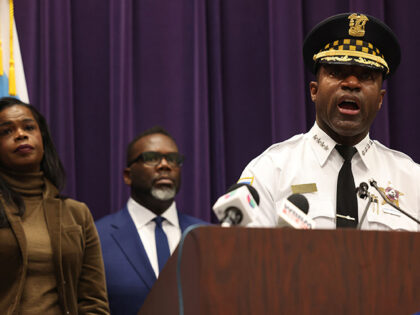 Chicago Police Superintendent Larry Snelling, flanked by Mayor Brandon Johnson and Cook Co