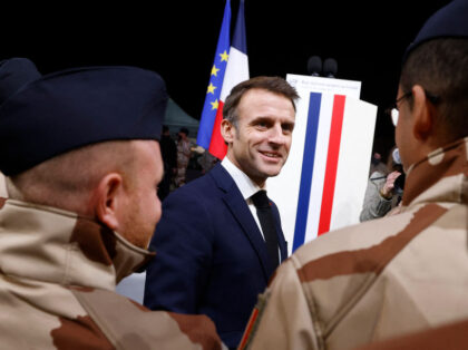 TOPSHOT - French President Emmanuel Macron meets French soldiers after he delivered a spee