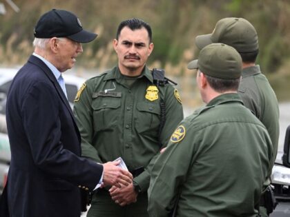 US President Joe Biden speaks with border patrol agents as he visits the US-Mexico border