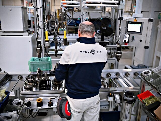 TURIN, ITALY - APRIL 10: Workers at work inside of the new Hybrid and PHEV Vehicles Stella