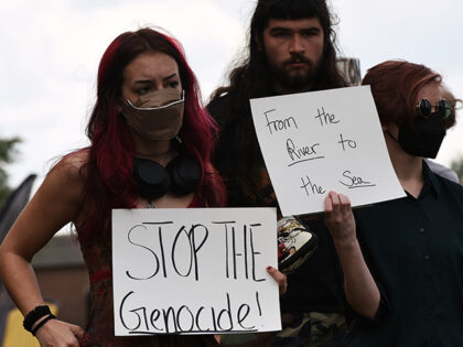 Students at the University of Central Florida take part in a campus protest against the on