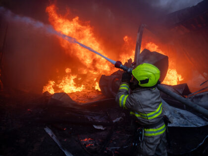 KHARKIV, UKRAINE - MAY 4: Rescuers, firefighters are extinguishing a fire at a meat proces