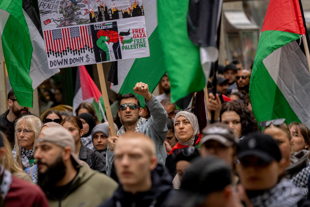 Demonstrators carry Palestinian flags protest against Israel's participation in the Eurovision Song Contest  in Malmö, Sweden, on May 9, 2024. Russian-Israeli singer Eden Golan representing Israel sang the song "Hurricane" in the second semi-final of the song competition. ( IDA MARIE ODGAARD/TT NEWS AGENCY/AFP via Getty I)
