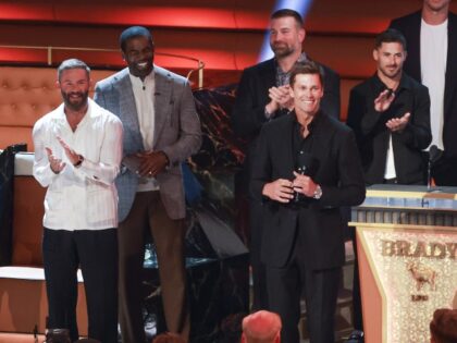 Tom Brady and roast participants onstage during G.R.O.A.T The Greatest Roast Of All Time:
