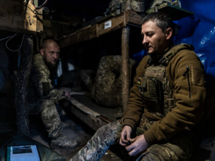 DONETSK OBLAST, UKRAINE - MAY 12: Ukrainian soldiers rest in a shelter, in their fighting