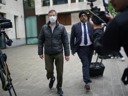 Chung Biu Yuen leaves Westminster Magistrates' Court, central London, where he was fr