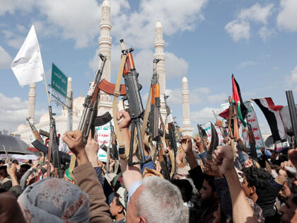 Yemenis participate in a mass demonstration staged in solidarity with the Palestinian peop